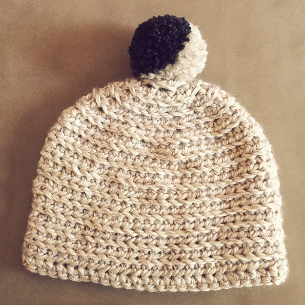 hat with fancy pompom